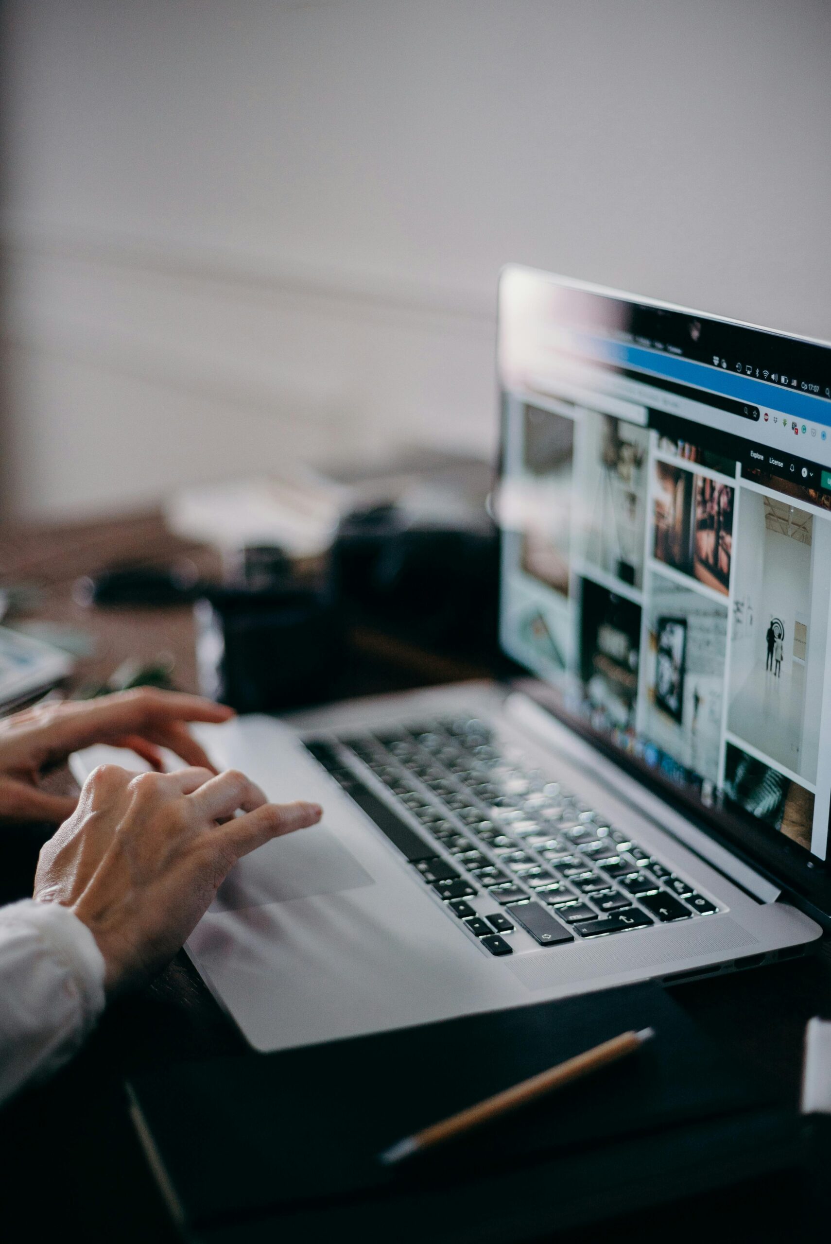 An Apple Mac laptop browing on the web